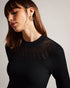 LATINIA-Dresses-This fluted knit dress is a fashion must-have. LATINIA's flattering silhouette, sleek fit and ribbed texture will look amazing with a pair of heels for a night out or worn with chunky boots for a laid back look. It features long sleeves, a crew neckline, a handy zip fastening and slim fit bodice. Midi dress Fluted skirt Ribbed texture Long sleeved Crew neck Zip fastening Slim fit bodice Julia is 5'10" / 1.78m and wears Black in a Ted size 1- Ted Baker Romania